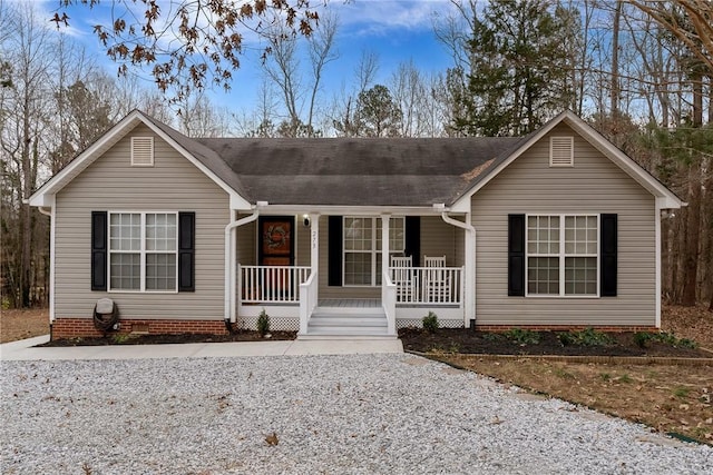 ranch-style house featuring a porch