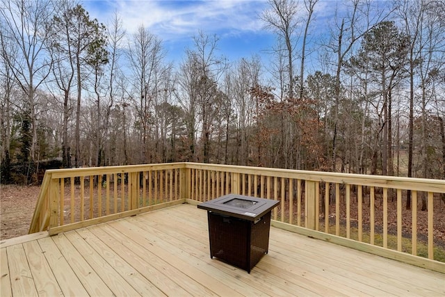 deck with a fire pit