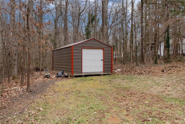 view of outdoor structure with a lawn