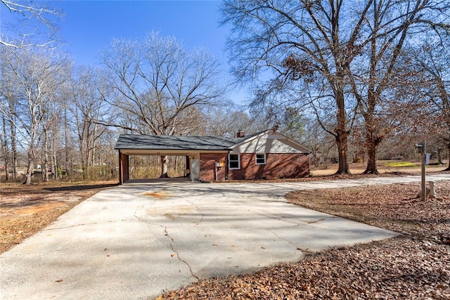 view of front facade with a carport