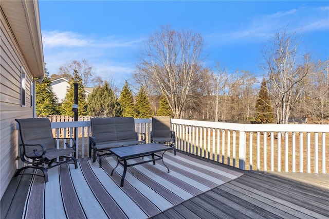 deck featuring outdoor lounge area