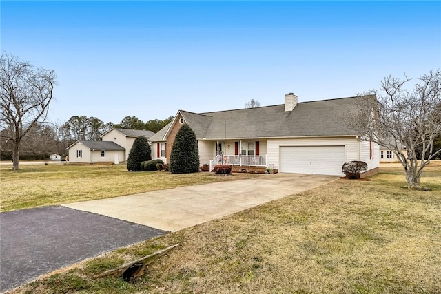 view of front of home featuring a garage, covered porch, and a front lawn