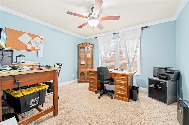 carpeted office space with crown molding and ceiling fan