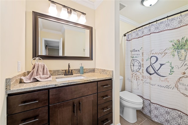 bathroom with ornamental molding, toilet, tile patterned flooring, and vanity