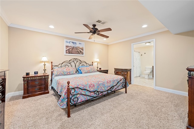 bedroom with ornamental molding, light carpet, connected bathroom, and ceiling fan