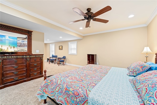 bedroom featuring crown molding, ceiling fan, and light colored carpet