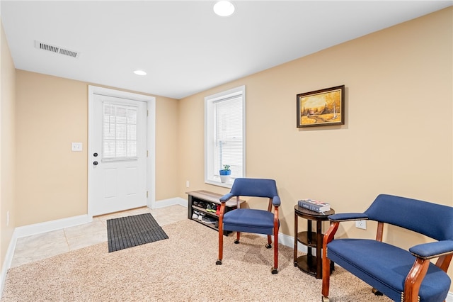 sitting room with light tile patterned flooring