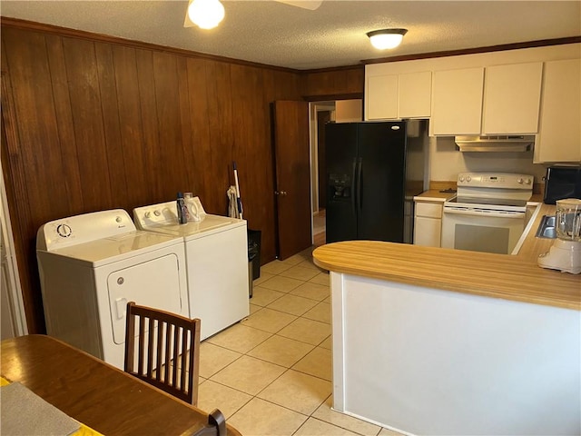 kitchen with washer and dryer, a textured ceiling, black refrigerator with ice dispenser, white range with electric cooktop, and light tile patterned floors