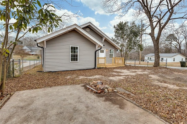 rear view of property with a deck