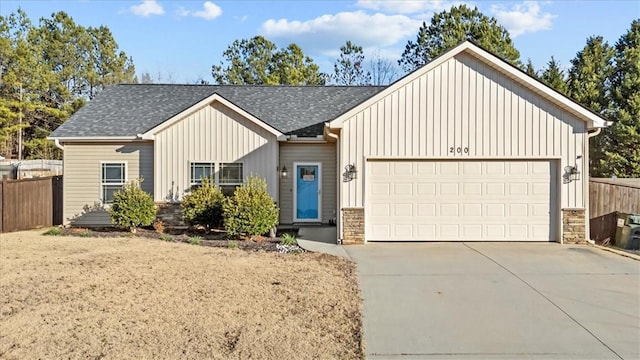 view of front of home with a garage