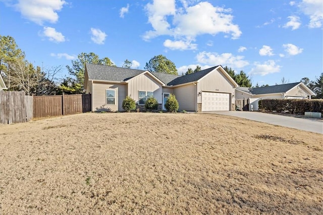 ranch-style house featuring a garage