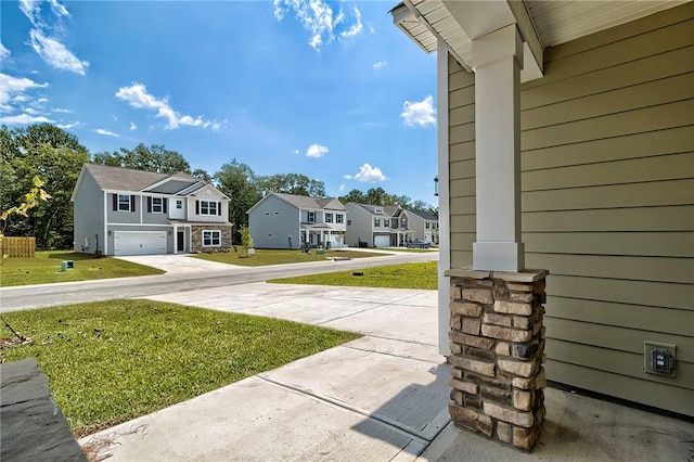 view of yard featuring a garage