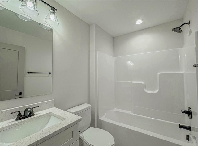 full bathroom featuring shower / tub combination, toilet, and vanity