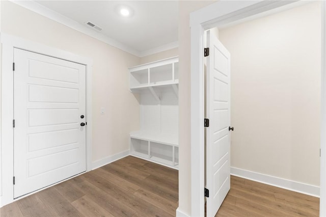 mudroom with hardwood / wood-style flooring and ornamental molding