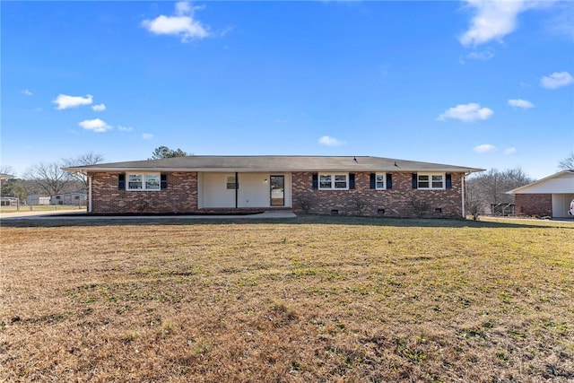 ranch-style home with a front yard