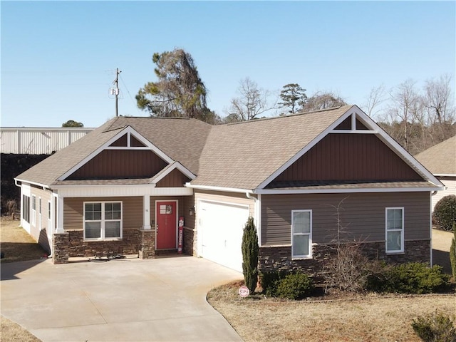 craftsman-style house with a garage and a porch