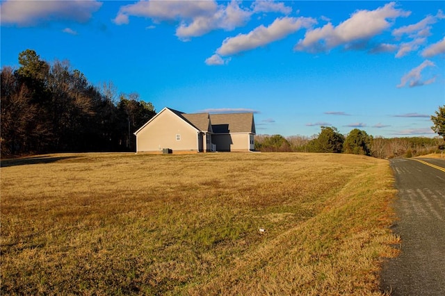 exterior space with a front lawn