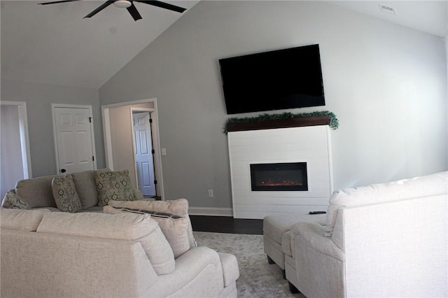 living room featuring light wood-type flooring, high vaulted ceiling, and ceiling fan