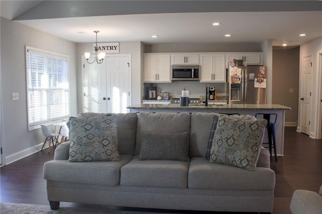 626 Johnny Long Rd, Iva, SC 29655 - living area featuring dark wood finished floors, baseboards, recessed lighting, and a chandelier