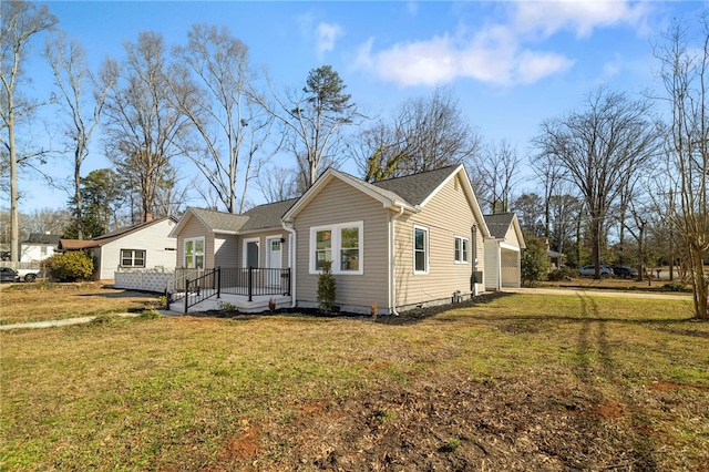 view of front facade with a garage and a front lawn