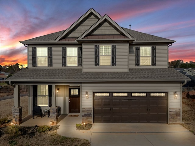 craftsman-style home with a garage