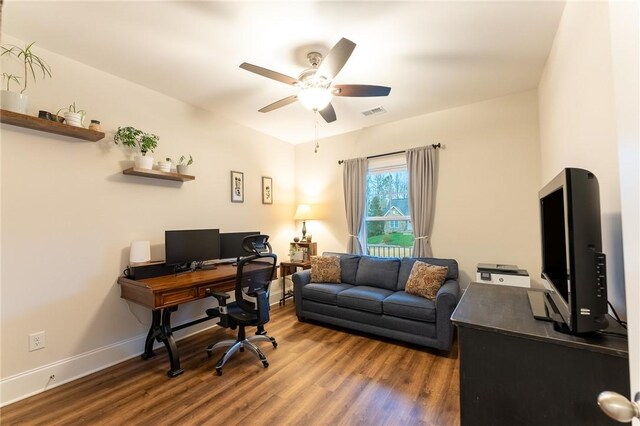 office area featuring dark hardwood / wood-style floors and ceiling fan