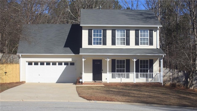 view of front of house with a porch and a garage