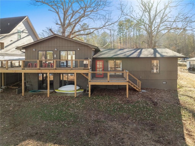 back of house featuring a deck and crawl space