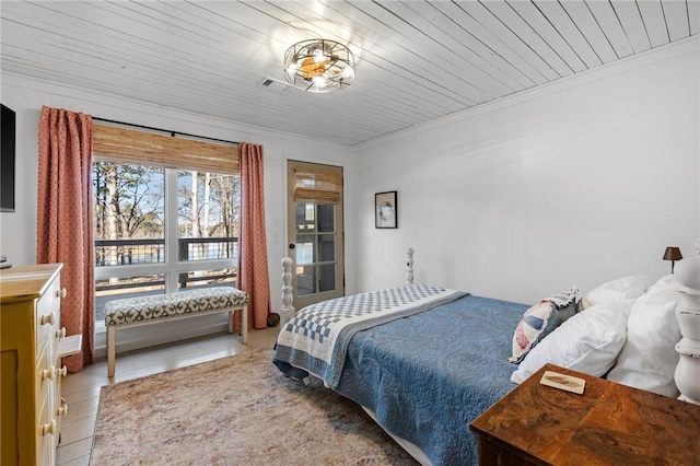 bedroom with ornamental molding