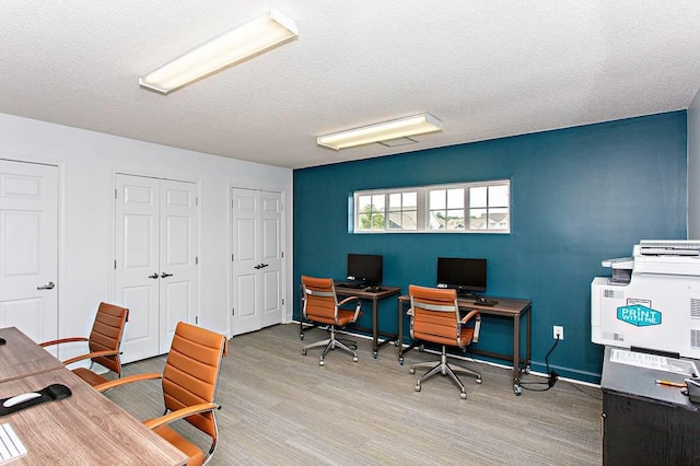 office area featuring a textured ceiling