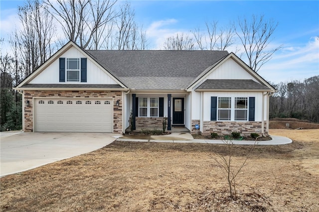 craftsman-style house with a garage and a front yard