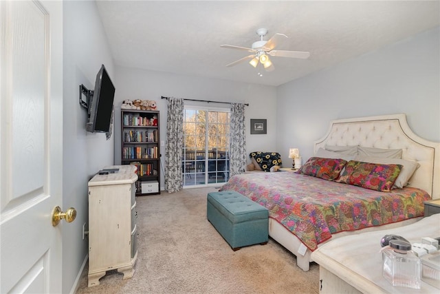 bedroom featuring light colored carpet and ceiling fan