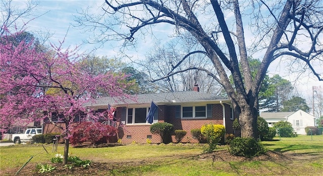 view of front of house with a front yard