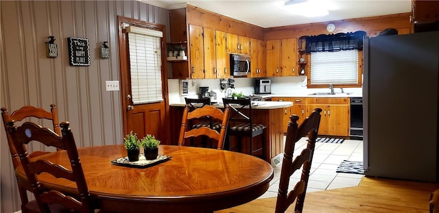 kitchen featuring sink, a healthy amount of sunlight, and appliances with stainless steel finishes