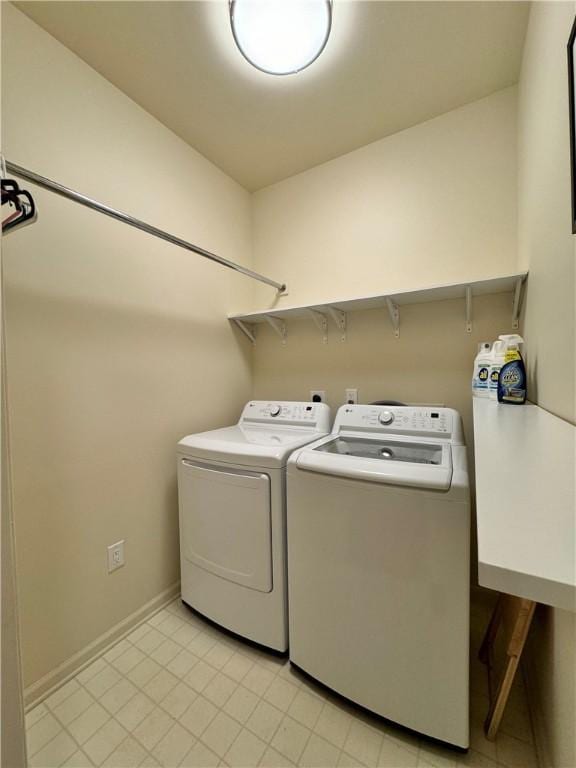 clothes washing area featuring washing machine and dryer