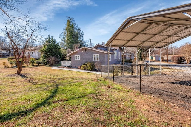 view of yard with a carport