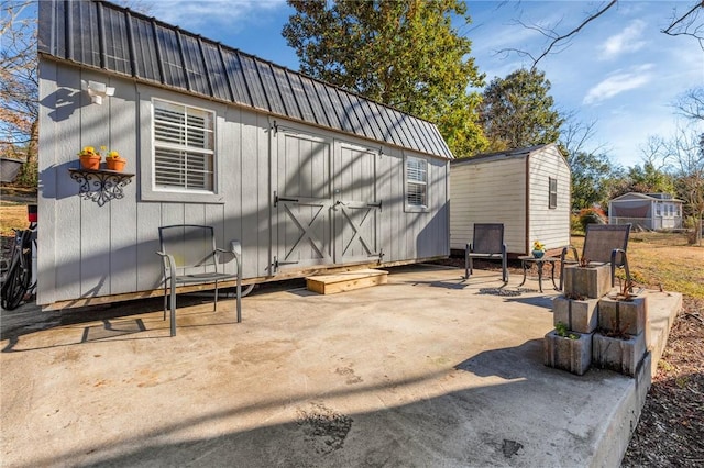 view of patio with a shed