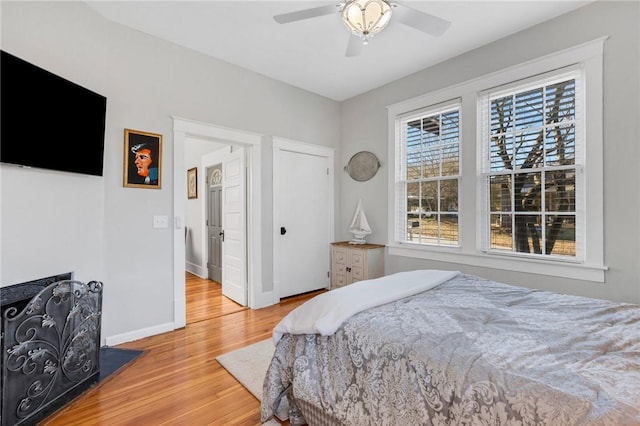 bedroom featuring ceiling fan and wood-type flooring