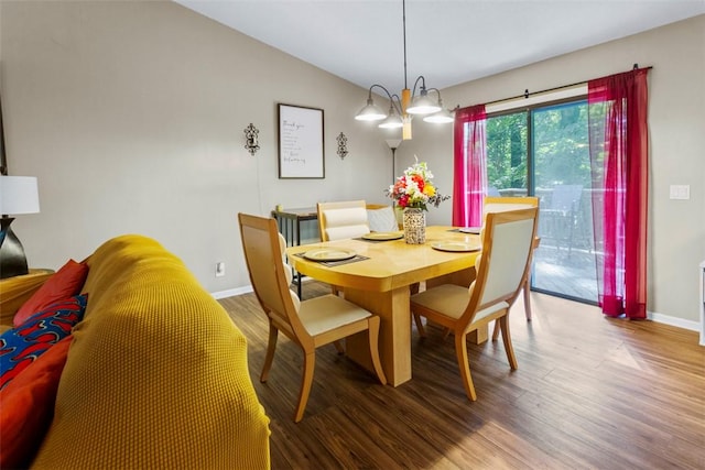 6 Ivy Ct, Seneca, SC 29678 - dining area with wood-type flooring, vaulted ceiling, and a notable chandelier