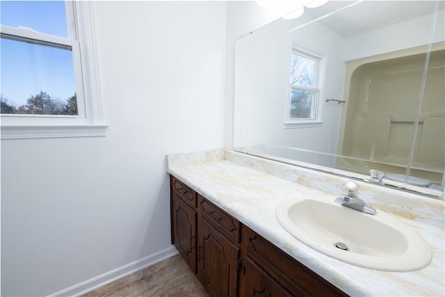 bathroom with vanity and tile patterned floors