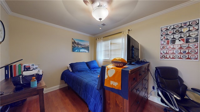 bedroom featuring crown molding, ceiling fan, and dark wood-type flooring