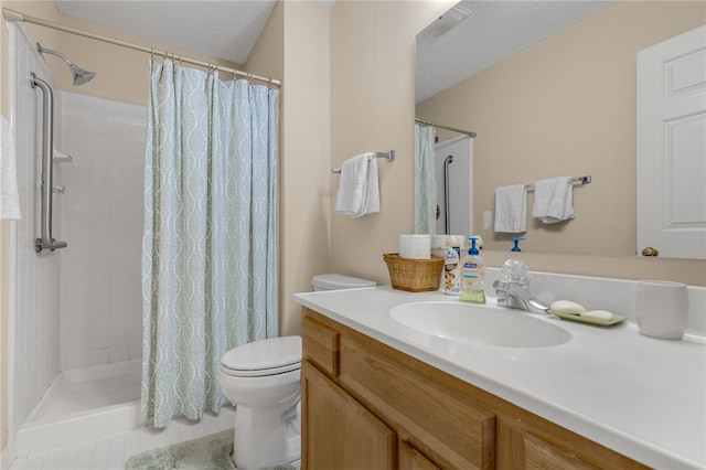 bathroom with vanity, toilet, and a shower with shower curtain