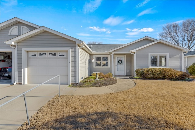 single story home with a garage and a front lawn