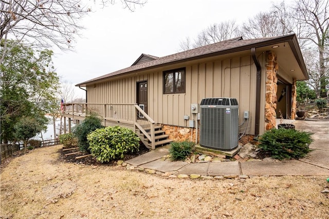 view of front of property with central air condition unit