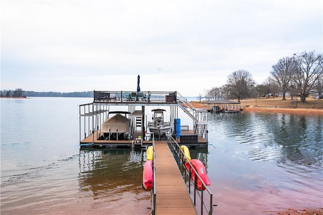 dock area with a water view