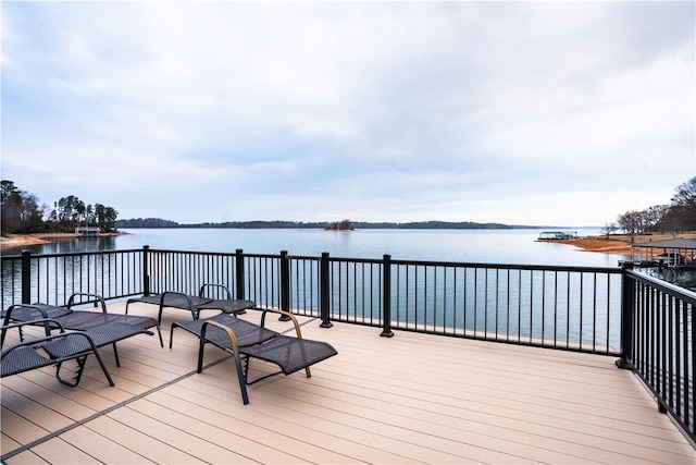 wooden terrace with a water view