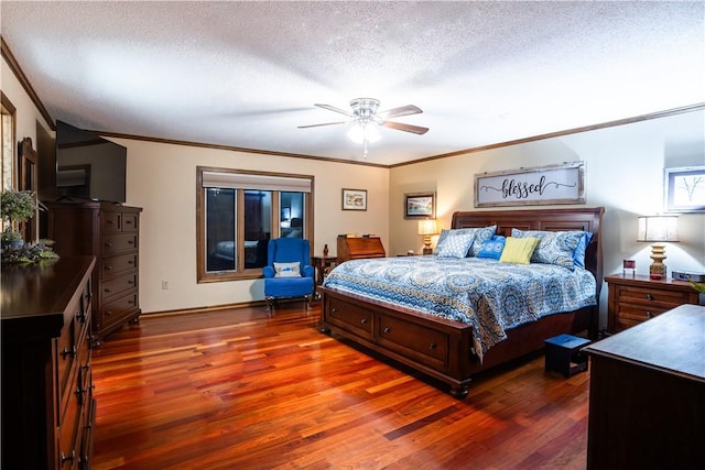 bedroom featuring crown molding, ceiling fan, hardwood / wood-style flooring, and a textured ceiling