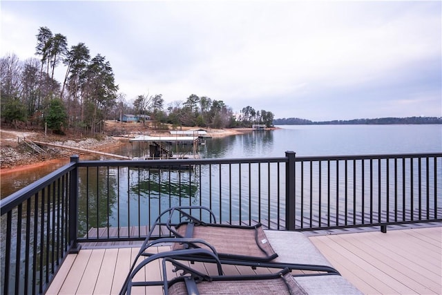 wooden terrace with a water view