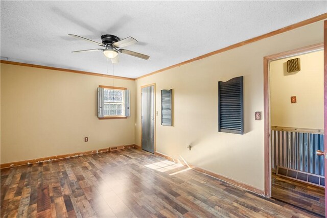 109 Pine Tree Ln, Anderson, SC 29625 - unfurnished room featuring a textured ceiling, ornamental molding, dark hardwood / wood-style floors, and ceiling fan