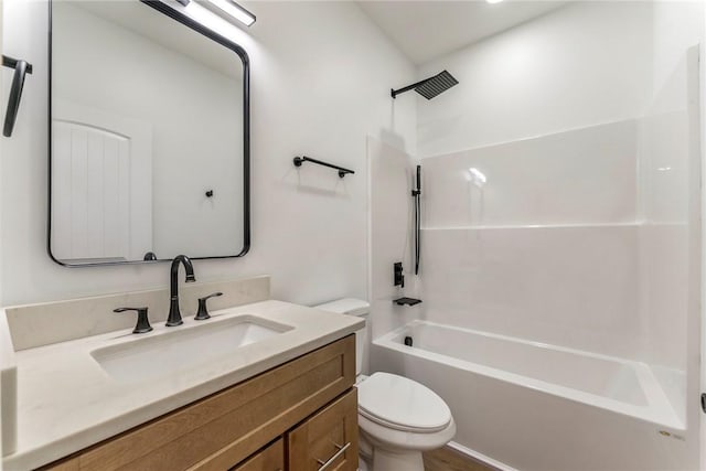 full bathroom featuring shower / bathtub combination, vanity, and toilet